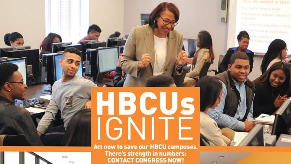 A group of students engaged in a classroom setting with computers. An instructor is speaking to them. The image includes a banner with "HBCUs IGNITE" and a call to contact Congress.
