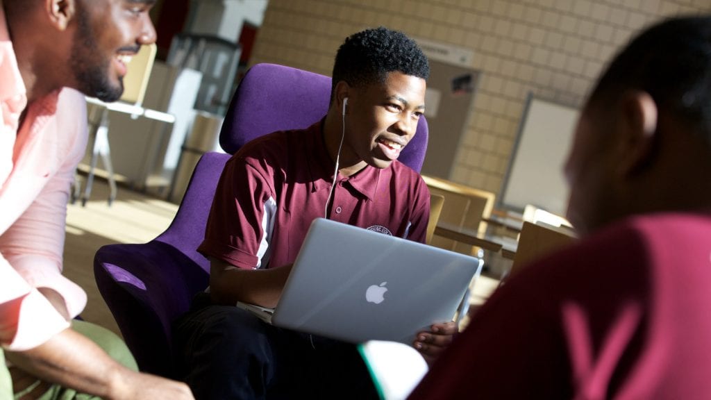 Three Morehouse students talking