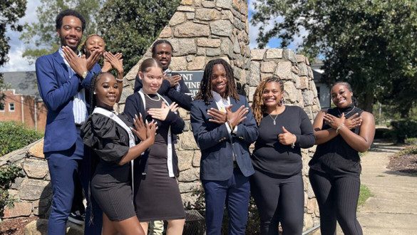 Photo of Saint Augustine's students posing together in formal wear