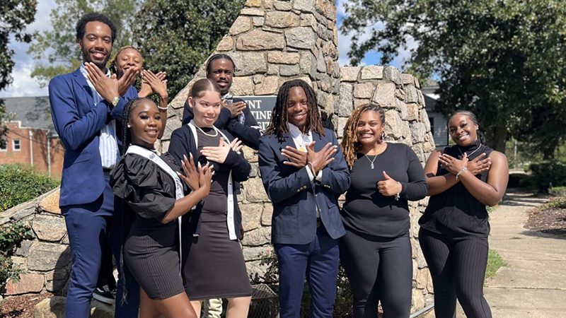 Photo of Saint Augustine's students posing together in formal wear