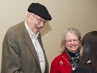 Bill Gates senior and wife and student laughing