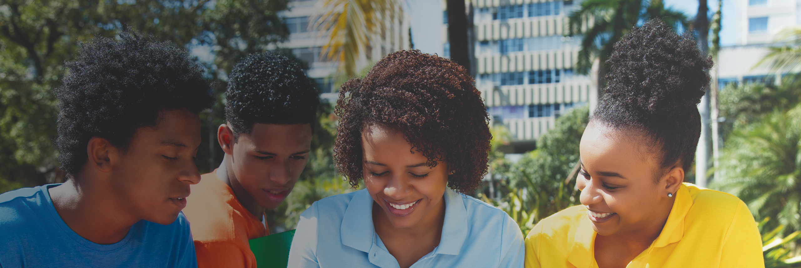 Group of students smiling outdoors