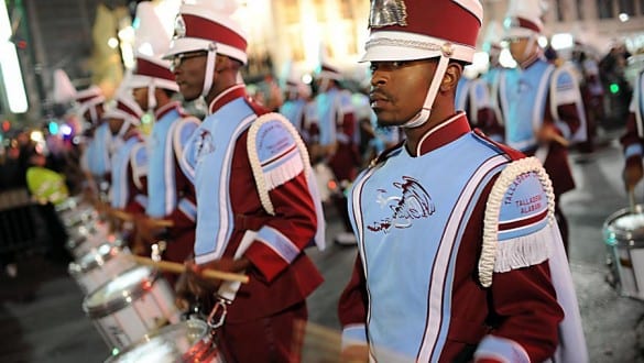 Group shot of Talladega College marching band members performing