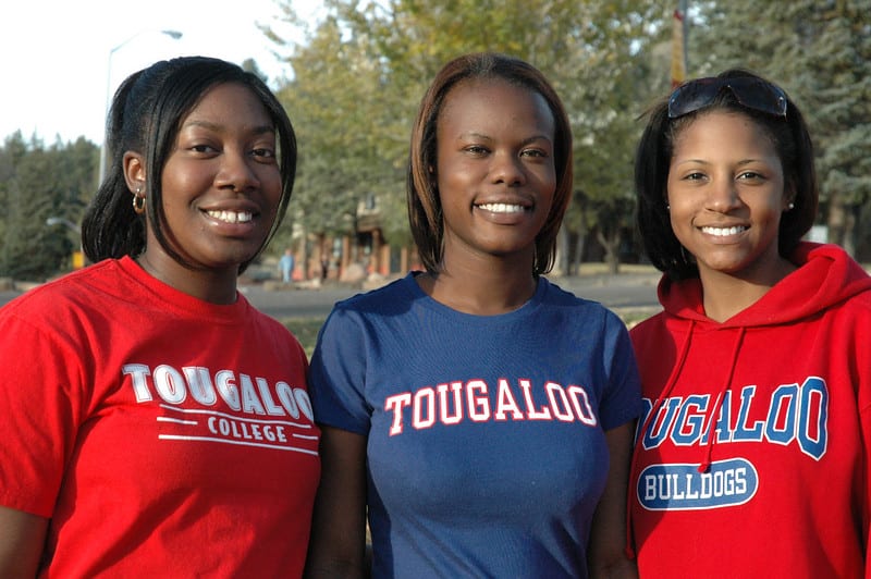 Group shot of 3 Tougaloo College girls smiling