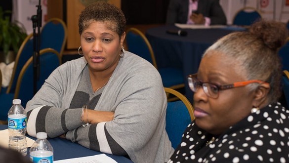 2 women attending a conference
